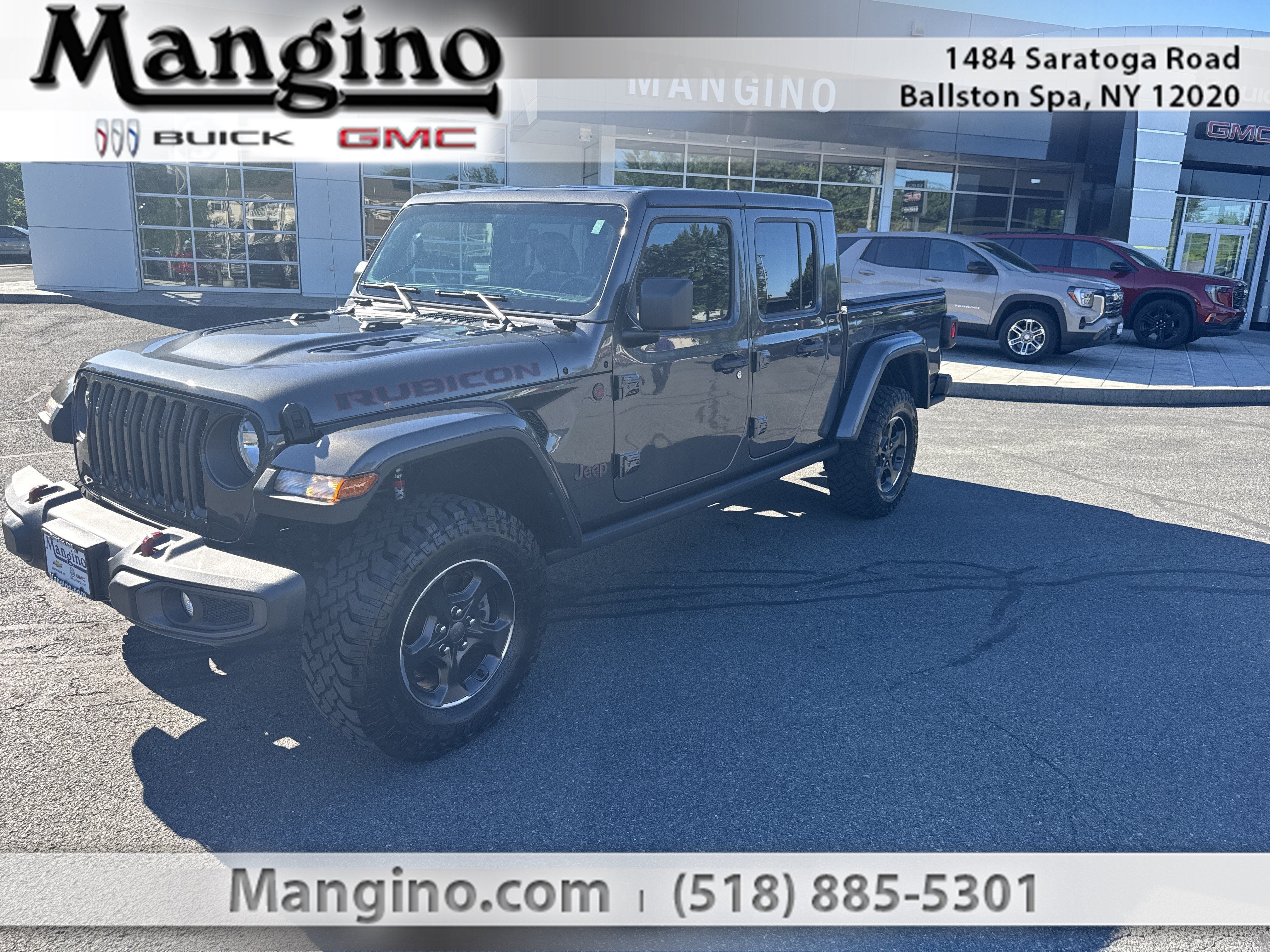 2022 Jeep Gladiator Rubicon 4x4 in Gray — front three-quarter view