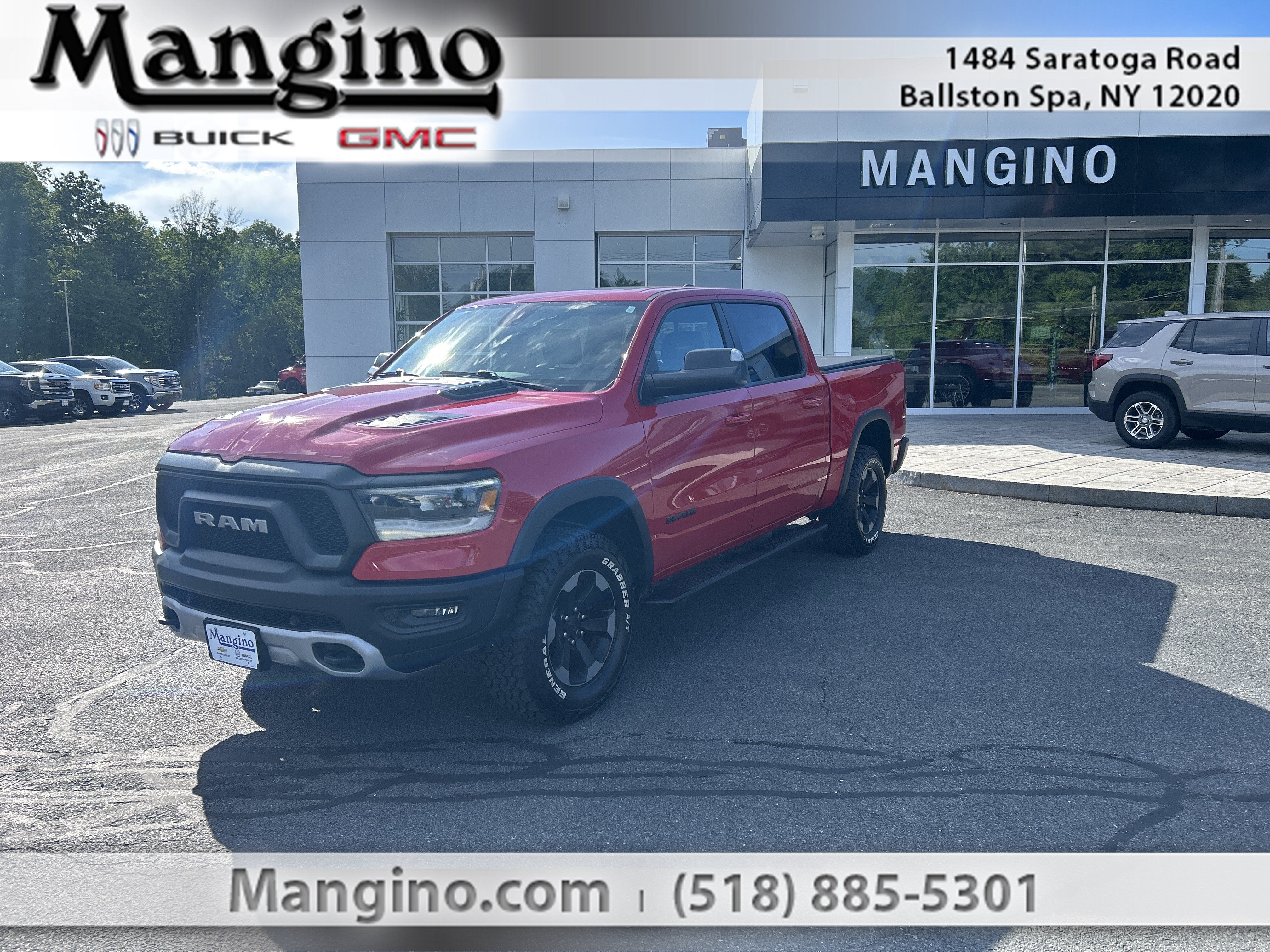 2019 RAM 1500 Rebel Crew Cab 4x4 5'7" Box in Red — front three-quarter view