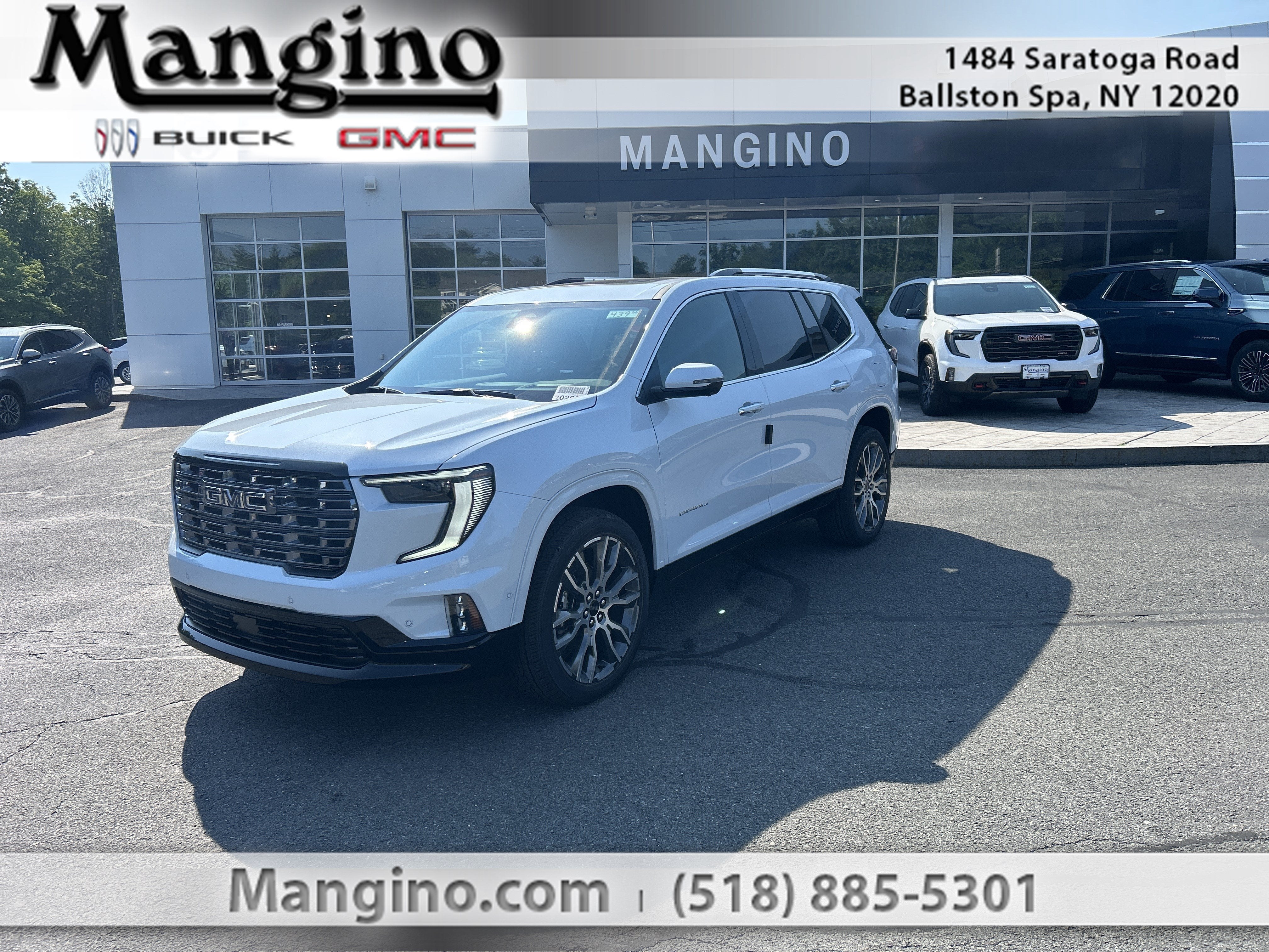 2026 GMC Acadia Denali Ultimate in Glacier White Tricoat — front three-quarter view