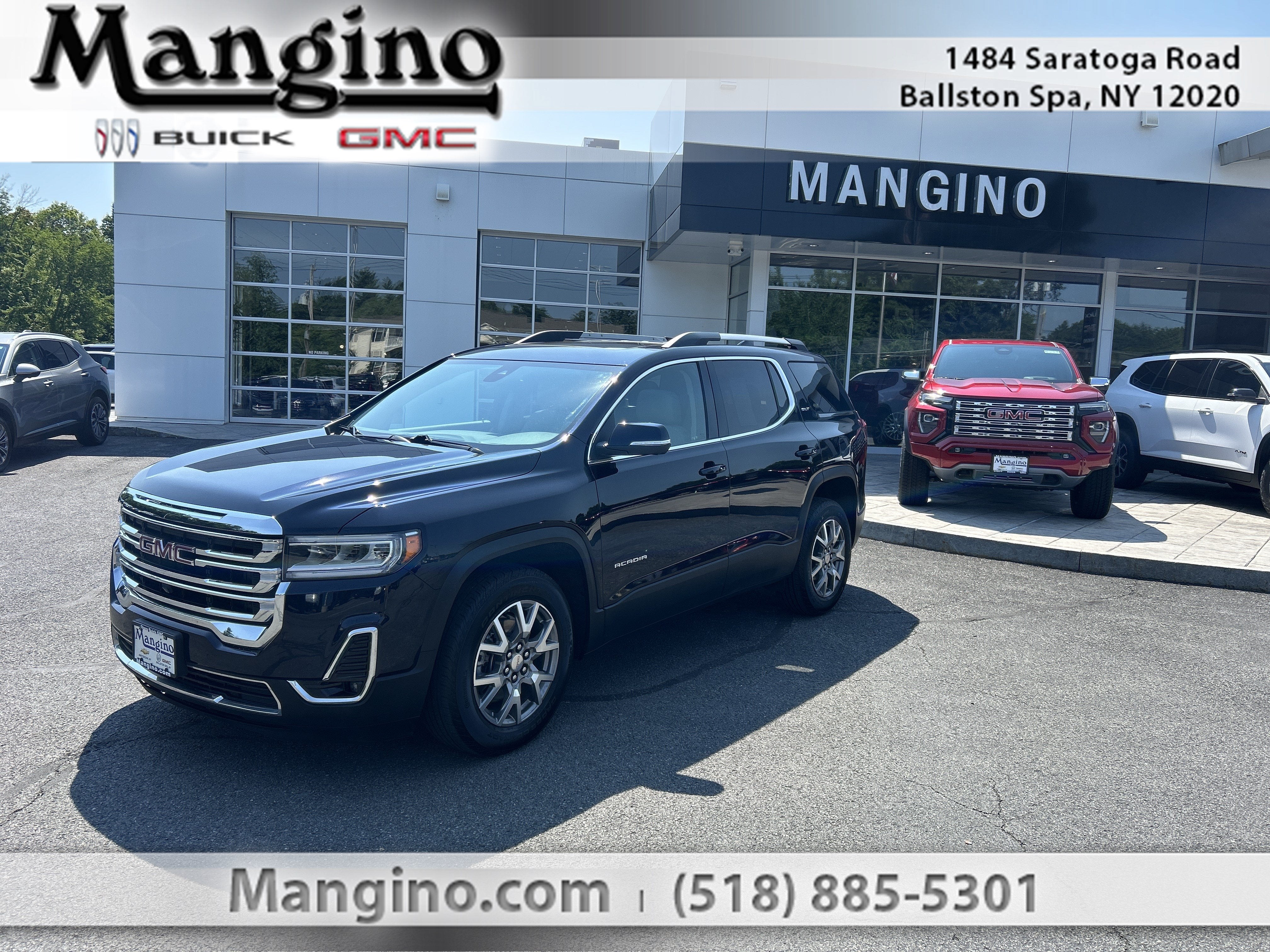 2021 GMC Acadia SLT in Midnight Blue Metallic — front three-quarter view