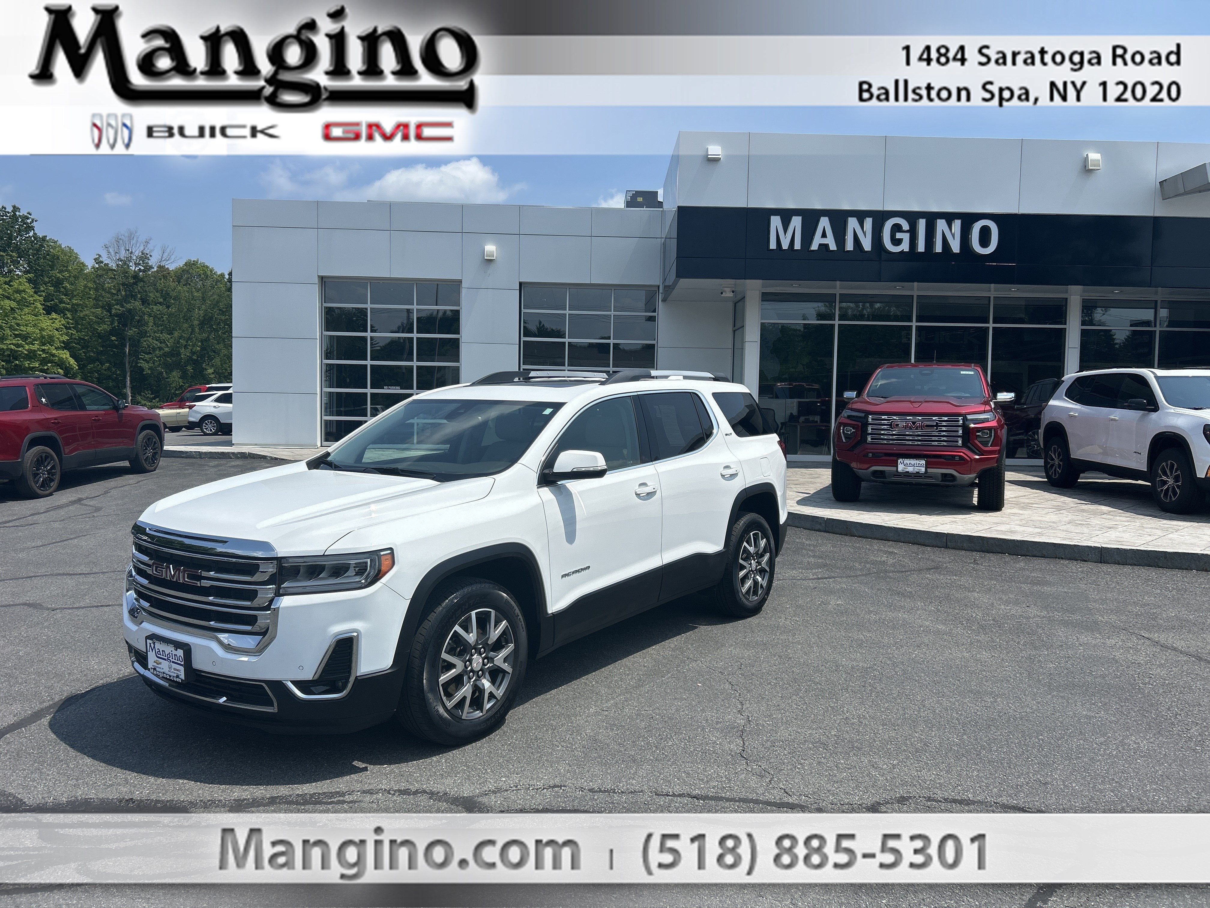 2023 GMC Acadia SLT in Summit White — front three-quarter view