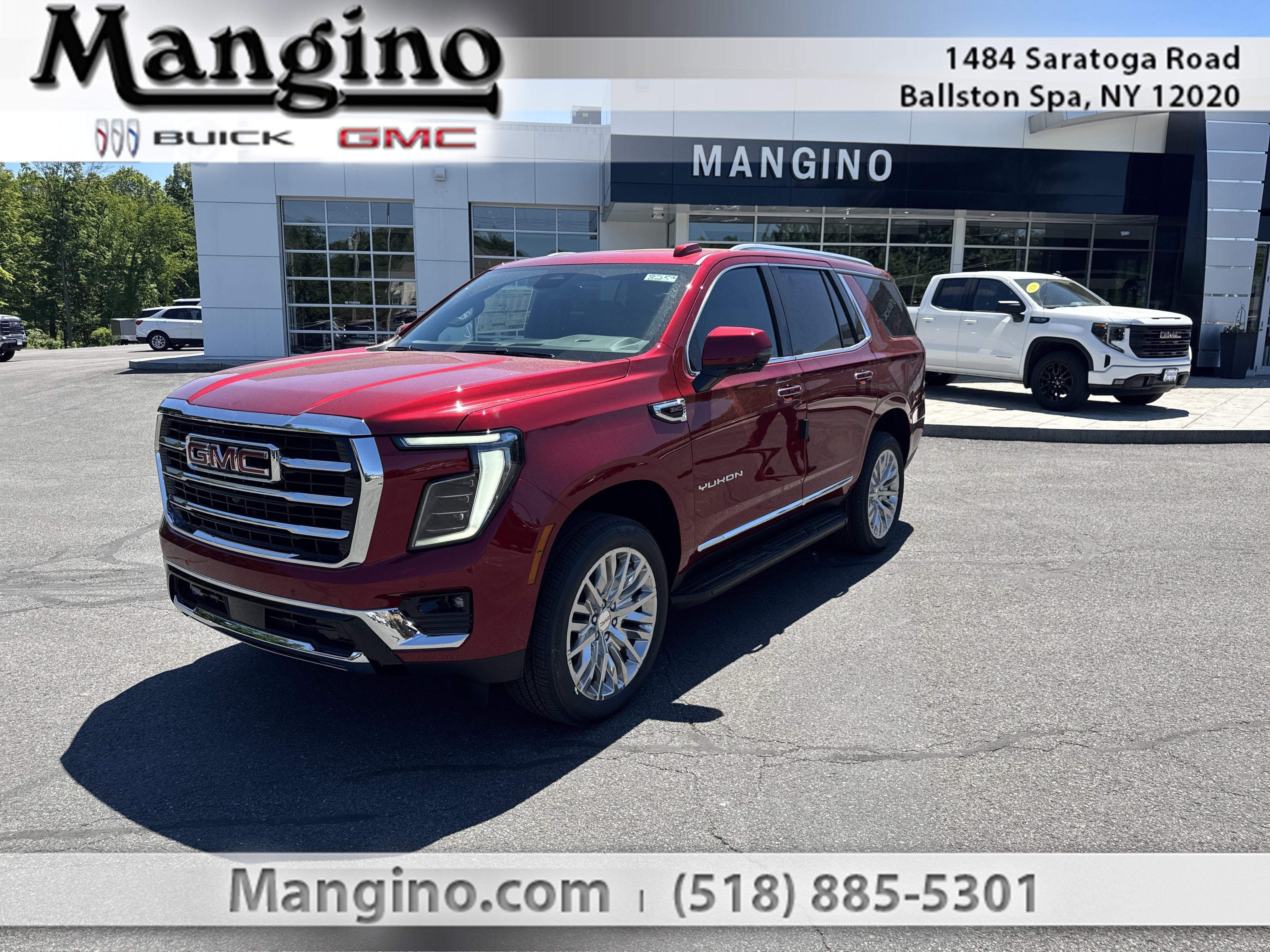 2026 GMC Yukon Elevation in Volcanic Red Tintcoat — front three-quarter view
