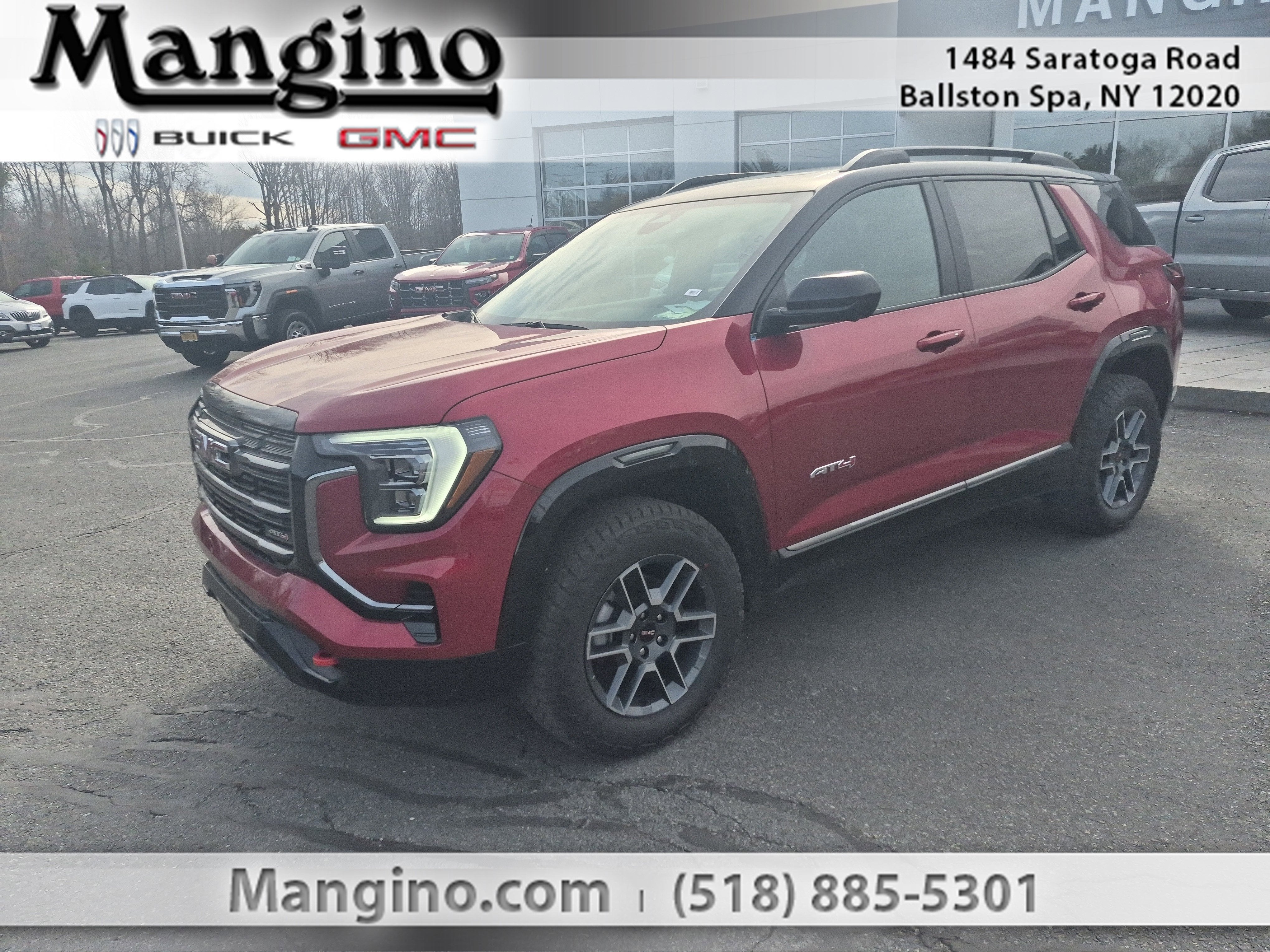 2026 GMC Terrain AT4 in Volcanic Red Tintcoat — front three-quarter view