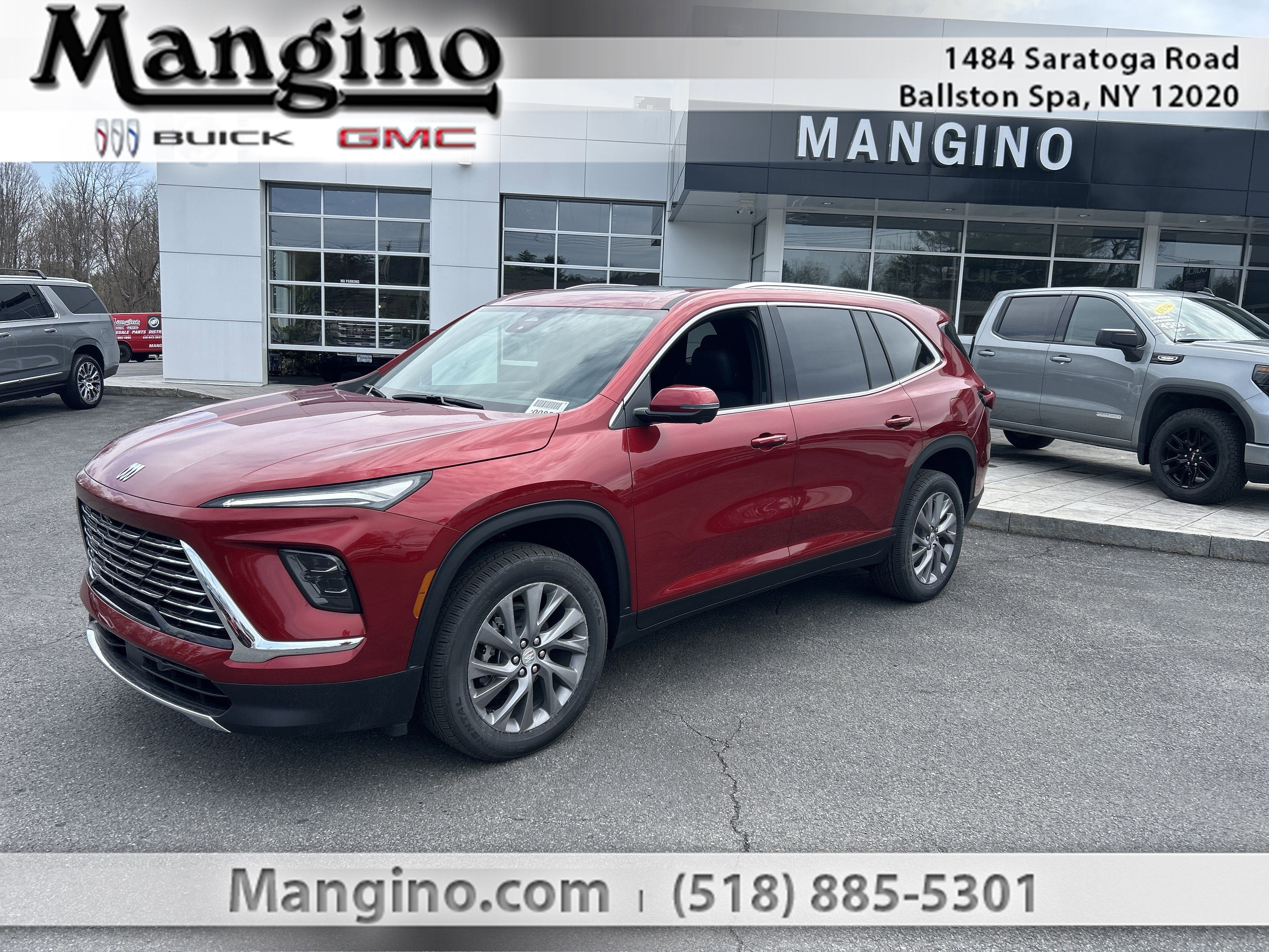 2026 Buick Enclave Preferred in Cherry Red Tintcoat — front three-quarter view