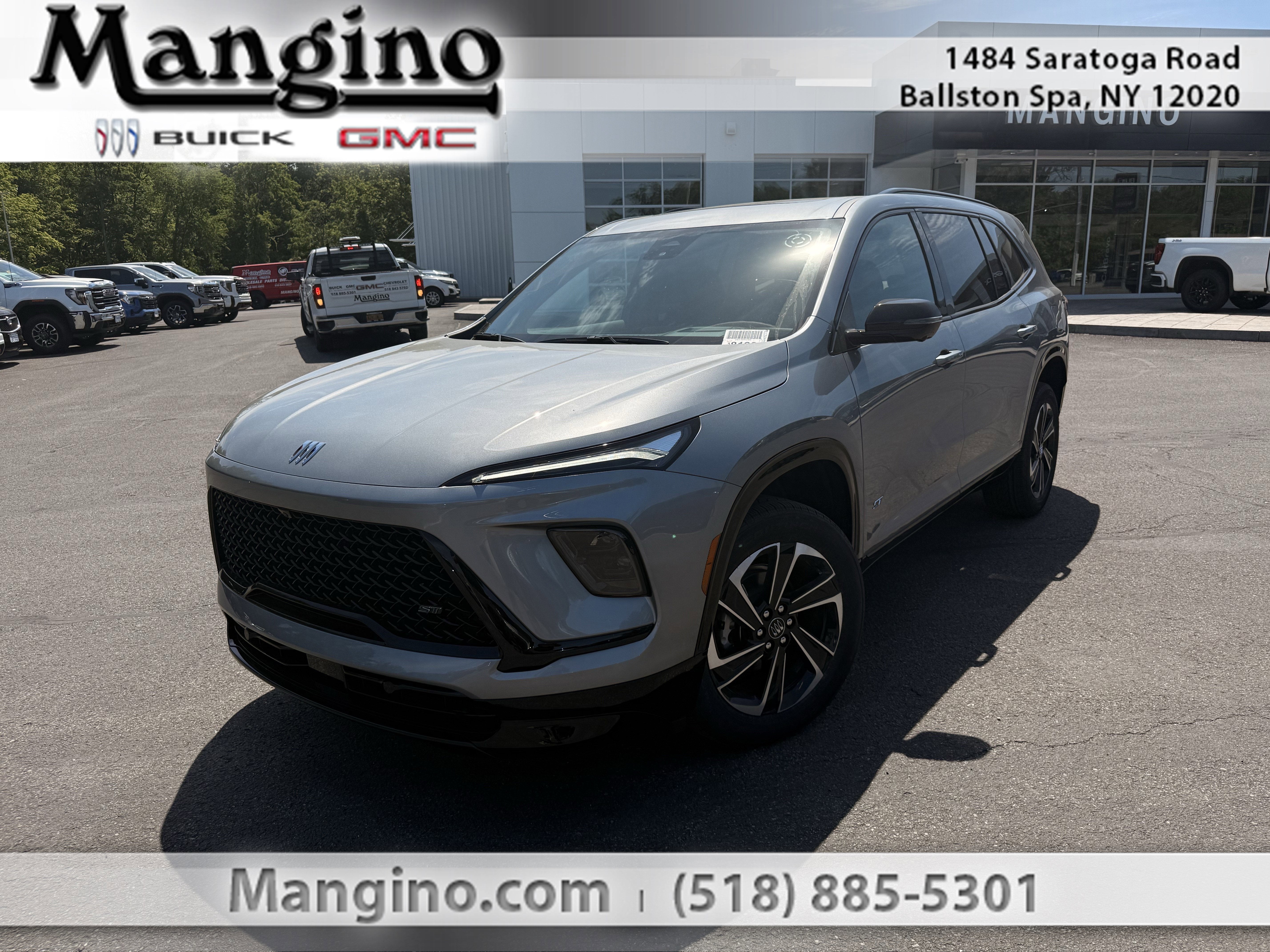2026 Buick Enclave Sport Touring in Moonstone Gray Metallic — front three-quarter view