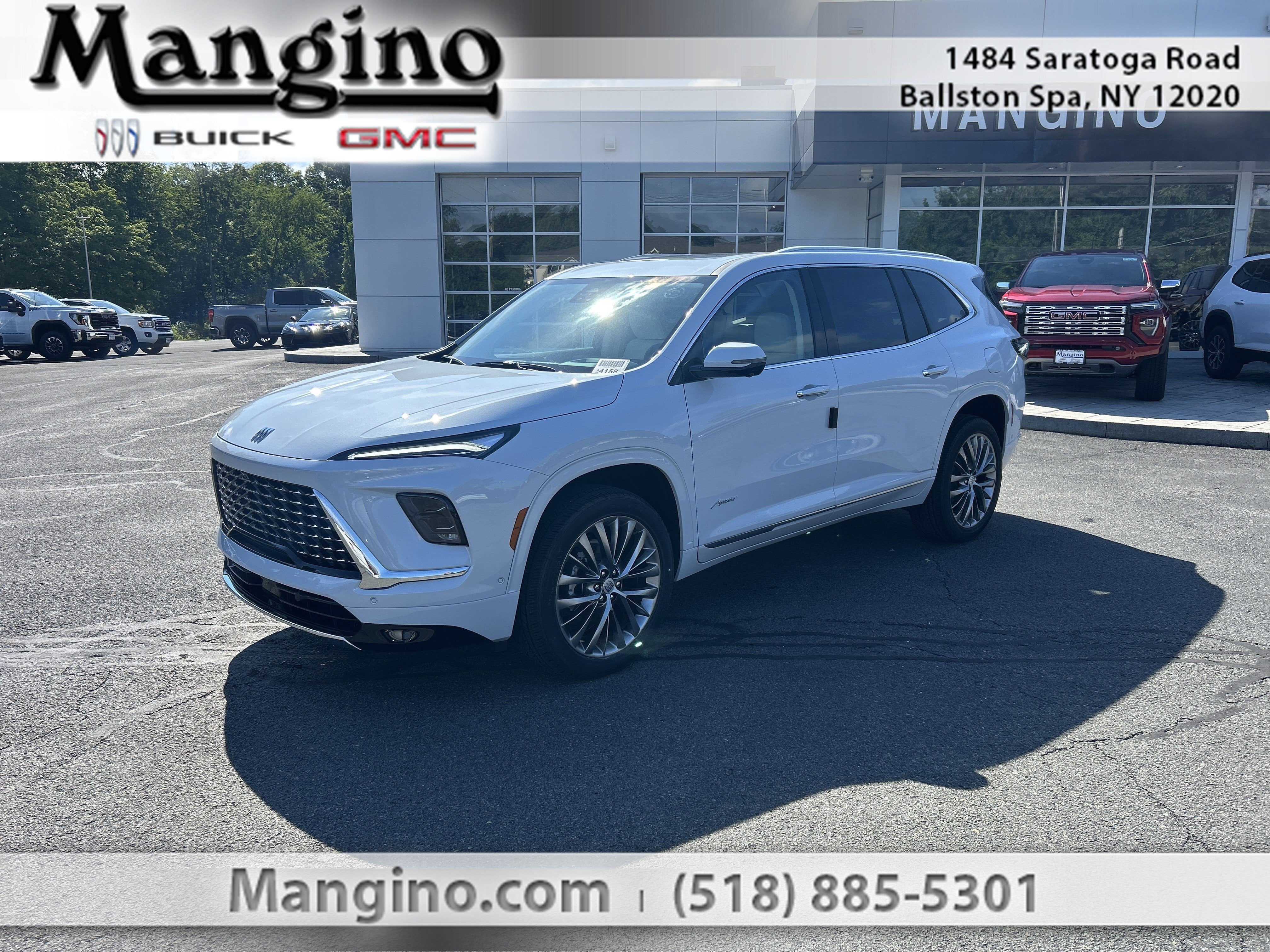 2026 Buick Enclave Avenir in Iridescent White Tricoat — front three-quarter view