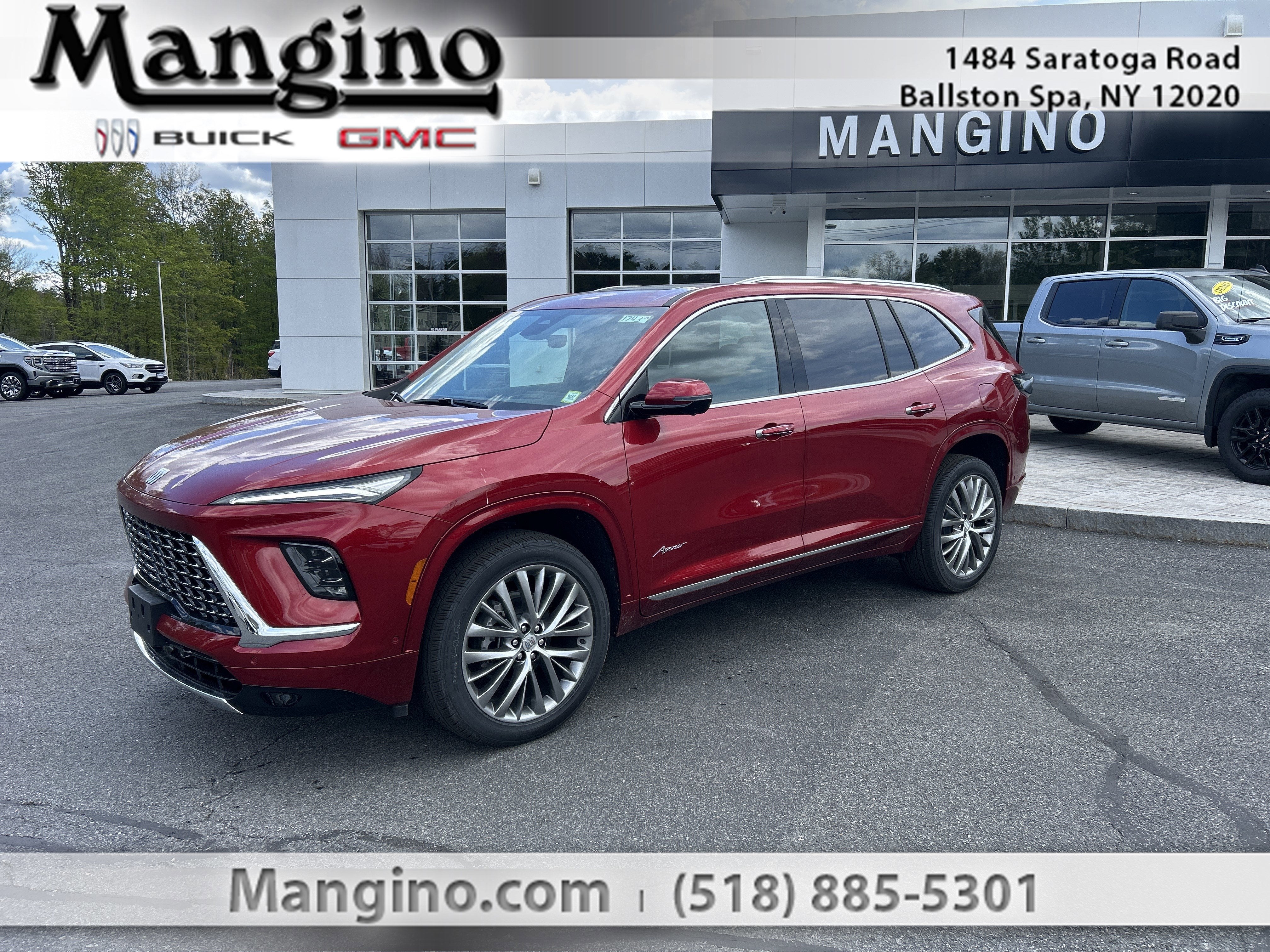 2026 Buick Enclave Avenir in Cherry Red Tintcoat — front three-quarter view